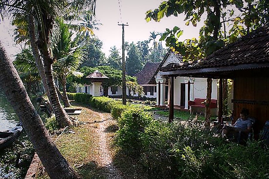 The garden path beside the canal, leading to the main house and its covered veranda